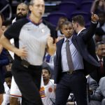 Phoenix Suns coach Earl Watson gives a thumbs-up to the Portland Trail Blazers bench after an NBA basketball game, Wednesday, Oct. 18, 2017, in Phoenix. The Trail Blazers won 124-76. (AP Photo/Matt York)