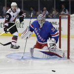 Arizona Coyotes' Derek Stepan (21) watches as New York Rangers goalie Ondrej Pavelec (31) stops a shot on goal during the first period of an NHL hockey game Thursday, Oct. 26, 2017, in New York. (AP Photo/Frank Franklin II)