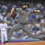 Arizona Diamondbacks starting pitcher Robbie Ray throws against the Los Angeles Dodgers during the first inning of Game 2 of baseball's National League Division Series in Los Angeles, Saturday, Oct. 7, 2017. (AP Photo/Mark J. Terrill)