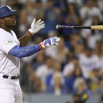 Los Angeles Dodgers' Yasiel Puig celebrates after a single against the Arizona Diamondbacks during the fourth inning of Game 2 of baseball's National League Division Series in Los Angeles, Saturday, Oct. 7, 2017. (AP Photo/Mark J. Terrill)