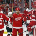 Detroit Red Wings left wing Darren Helm (43) celebrates his empty net goal against the Arizona Coyotes in the third period of an NHL hockey game Tuesday, Oct. 31, 2017, in Detroit. Detroit won 5-3. (AP Photo/Paul Sancya)