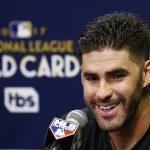 Arizona Diamondbacks right fielder J.D. Martinez smiles a he answers a question during a news conference at Chase Field, Tuesday, Oct. 3, 2017, in Phoenix, as the team gets ready for a National League wild card playoff baseball game. The Diamondbacks host the Colorado Rockies on Wednesday. (AP Photo/Ross D. Franklin)