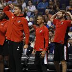 Players on the Portland Trail Blazers bench celebrate during the second half of the team's NBA basketball game against the Phoenix Suns, Wednesday, Oct. 18, 2017, in Phoenix. (AP Photo/Matt York)