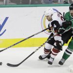 Arizona Coyotes center Zac Rinaldo (34) and Dallas Stars center Tyler Seguin (91) skate for control of the puck during the second period of an NHL hockey game in Dallas, Tuesday, Oct. 17, 2017. (AP Photo/LM Otero)