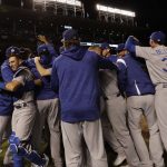 The Los Angeles Dodgers players celebrate after Game 5 of baseball's National League Championship Series against the Chicago Cubs, Thursday, Oct. 19, 2017, in Chicago. The Dodgers won 11-1 to win the series and advance to the World Series. (AP Photo/Matt Slocum)