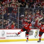New Jersey Devils' Taylor Hall (9) celebrates scoring his second goal of the game against the Arizona Coyotes during the third period of an NHL hockey game, Saturday, Oct. 28, 2017, in Newark, N.J. The Devils won 4-3. (AP Photo/Adam Hunger)