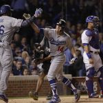 Los Angeles Dodgers' Enrique Hernandez (14) celebrates his grand slam with Yasiel Puig (66) during the third inning of Game 5 of baseball's National League Championship Series against the Chicago Cubs, Thursday, Oct. 19, 2017, in Chicago. (AP Photo/Matt Slocum)