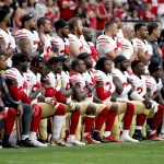 Members of the San Francisco 49ers kneel during the national anthem as others stand during the first half of an NFL football game against the Arizona Cardinals, Sunday, Oct. 1, 2017, in Glendale, Ariz. (AP Photo/Rick Scuteri)
