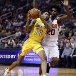 Los Angeles Lakers forward Brandon Ingram (14) drives past Phoenix Suns forward Josh Jackson (20) during the first half of an NBA basketball game, Friday, Oct. 20, 2017, in Phoenix. (AP Photo/Matt York)