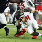 Tampa Bay Buccaneers quarterback Ryan Fitzpatrick (14) dives for yardage against the Arizona Cardinals during the first half of an NFL football game, Sunday, Oct. 15, 2017, in Glendale, Ariz. (AP Photo/Ralph Freso)