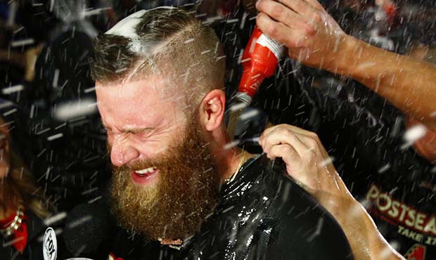 Arizona Diamondbacks relief pitcher Archie Bradley is doused by teammates after the National League...