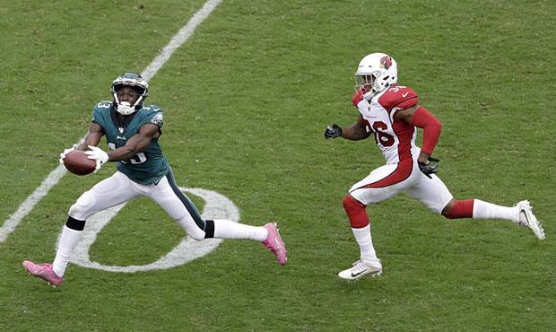 Philadelphia Eagles' Nelson Agholor, left, catches a touchdown pass against Arizona Cardinals' Budd...