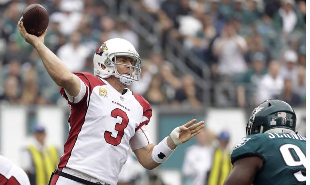 Arizona Cardinals QB Carson Palmer passes during the first half of an NFL football game against the...