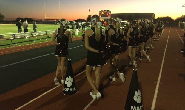 Desert Mountain Cheerleaders during the national anthem before the football game. Photo taken by Br...