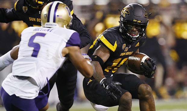 Arizona State wide receiver Kyle Williams (10) tries to get past Washington defensive back Myles Br...