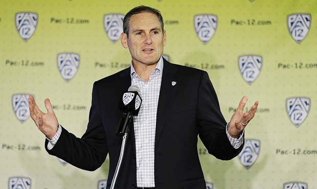 Pac-12 Commissioner Larry Scott speaks during the Pac-12's NCAA college basketball media day, Thurs...