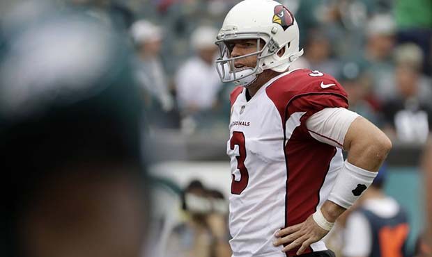 Arizona Cardinals' Carson Palmer reacts during the second half of an NFL football game against the ...