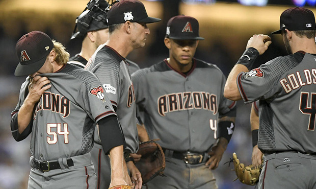 Arizona Diamondbacks relief pitcher Jimmie Sherfy is taken out of the game against the Los Angeles ...
