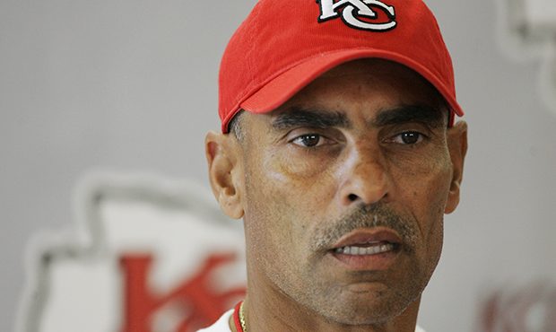 Kansas City Chiefs coach Herm Edwards answers a reporters question following the first training cam...