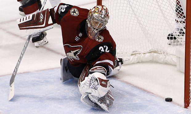 Arizona Coyotes goalie Antti Raanta gives up a goal to Winnipeg Jets left wing Kyle Connor during t...