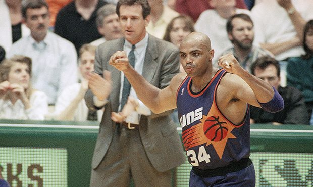 Phoenix's Charles Barkley celebrates as his coach Paul Westphal cheers him on as they rolled to a 1...