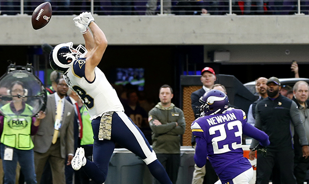 Los Angeles Rams wide receiver Cooper Kupp, left, misses a pass in front of Minnesota Vikings corne...