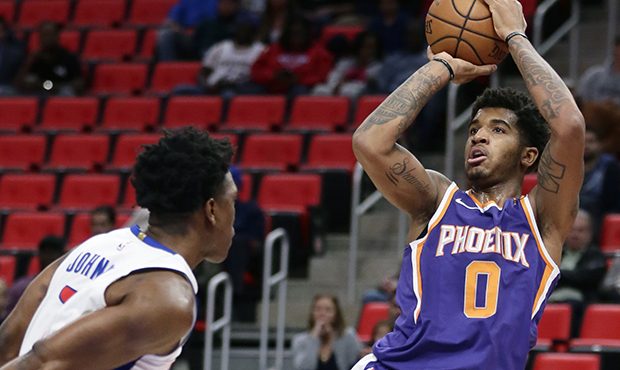 Phoenix Suns forward Marquese Chriss (0) takes a shot against Detroit Pistons forward Stanley Johns...