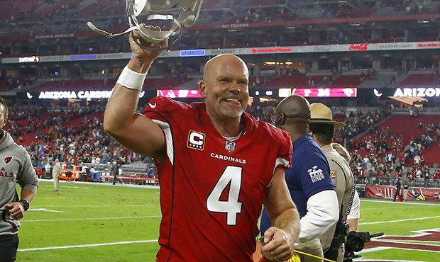 Arizona Cardinals kicker Phil Dawson (4) leaves the field after an NFL football game against the Ja...