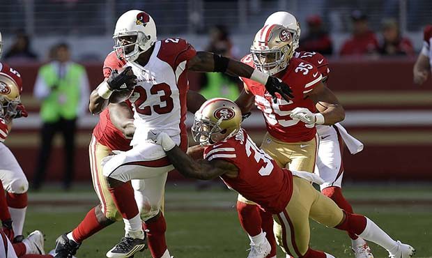 Arizona Cardinals running back Adrian Peterson (23) runs against the San Francisco 49ers during the...