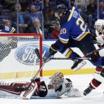 St. Louis Blues' Alexander Steen (20) leaps over Arizona Coyotes goalie Antti Raanta, of Finland, during the second period of an NHL hockey game Thursday, Nov. 9, 2017, in St. Louis. (AP Photo/Jeff Roberson)