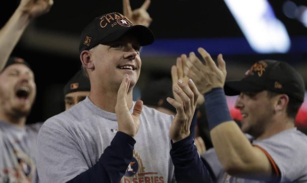 Houston Astros manager A.J. Hinch celebrates after Game 7 of baseball's World Series against the Lo...