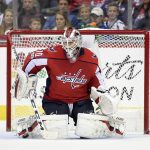 Washington Capitals goalie Braden Holtby (70) stops the puck during the second period of an NHL hockey game against the Arizona Coyotes, Monday, Nov. 6, 2017, in Washington. (AP Photo/Nick Wass)