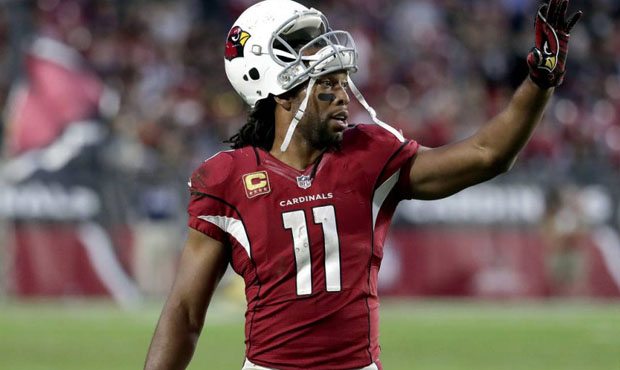Arizona Cardinals wide receiver Larry Fitzgerald (11) waves during the second half of an NFL footba...