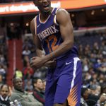 Phoenix Suns forward TJ Warren (12) reacts during the second half of an NBA basketball game against the Washington Wizards, Wednesday, Nov. 1, 2017, in Washington. The Suns won 122-116. (AP Photo/Nick Wass)