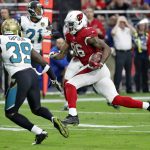 Arizona Cardinals tight end Ricky Seals-Jones (86) runs after the catch for a touchdown as Jacksonville Jaguars free safety Tashaun Gipson (39) and pursues during the first half of an NFL football game, Sunday, Nov. 26, 2017, in Glendale, Ariz. (AP Photo/Rick Scuteri)