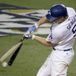 Los Angeles Dodgers' Corey Seager break his bat and grounds out against the Houston Astros during the sixth inning of Game 7 of baseball's World Series Wednesday, Nov. 1, 2017, in Los Angeles. (AP Photo/Jae C. Hong)