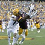 Arizona State wide receiver N'Keal Harry (1) catches a touchdown in front of Arizona cornerback Jace Whittaker in the second half during an NCAA college football game, Saturday, Nov 25, 2017, in Tempe, Ariz. Arizona State defeated Arizona 42-30. (AP Photo/Rick Scuteri)