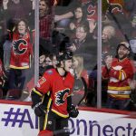 Calgary Flames' Mark Jankowski celebrates scoring on the Arizona Coyotes during the second period of an NHL hockey game Thursday, Nov. 30, 2017, in Calgary, Alberta. (Lyle Aspinall/The Canadian Press via AP)