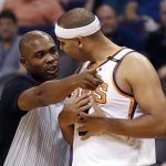 Phoenix Suns forward Jared Dudley argues a call with referee Eli Roe during the first half of an NBA basketball game against the Miami Heat, Wednesday, Nov. 8, 2017, in Phoenix. (AP Photo/Matt York)