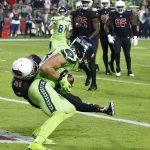 Seattle Seahawks tight end Jimmy Graham pulls in a touchdown pass as Arizona Cardinals strong safety Antoine Bethea (41) defends during the second half of an NFL football game, Thursday, Nov. 9, 2017, in Glendale, Ariz(AP Photo/Ross D. Franklin)