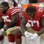 San Francisco 49ers offensive guard Laken Tomlinson (75) and offensive tackle Trent Brown (77) sit on the bench during the second half of an NFL football game against the Arizona Cardinals in Santa Clara, Calif., Sunday, Nov. 5, 2017. (AP Photo/Marcio Jose Sanchez)