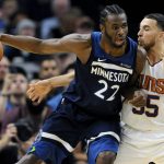 Phoenix Suns' Mike James (55) guards against Minnesota Timberwolves' Andrew Wiggins (22) during the second quarter of an NBA basketball game on Sunday, Nov. 26, 2017, in Minneapolis. (AP Photo/Hannah Foslien)