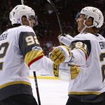 Vegas Golden Knights left wing Tomas Nosek (92) celebrates his goal against the Arizona Coyotes with center Cody Eakin (21) during the second period of an NHL hockey game Saturday, Nov. 25, 2017, in Glendale, Ariz. (AP Photo/Ross D. Franklin)