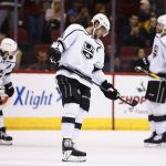 Los Angeles Kings defenseman Drew Doughty (8), center Anze Kopitar, center, and defenseman Derek Forbort (24) pause on the ice after a goal scored by Arizona Coyotes' Oliver Ekman-Larsson during the first period of an NHL hockey game Friday, Nov. 24, 2017, in Glendale, Ariz. (AP Photo/Ross D. Franklin)