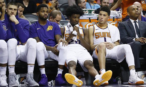 Phoenix Suns center Alex Len, from left, guard Troy Daniels, forward Josh Jackson and guard Devin B...