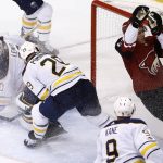 Arizona Coyotes center Nick Cousins, right, scores a goal against Buffalo Sabres goalie Robin Lehner (40) as Sabres right wing Jason Pominville (29) and left wing Evander Kane (9) try to defend during the third period of an NHL hockey game Thursday, Nov. 2, 2017, in Glendale, Ariz. The Sabres won 5-4. (AP Photo/Ross D. Franklin)