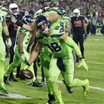 Seattle Seahawks tight end Jimmy Graham (88) celebrates his touchdown catch against the Arizona Cardinals during the second half of an NFL football game, Thursday, Nov. 9, 2017, in Glendale, Ariz. (AP Photo/Ross D. Franklin)