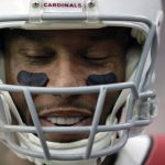 Arizona Cardinals wide receiver Larry Fitzgerald (11) smiles on the sidelines during the first half of an NFL football game against the Houston Texans, Sunday, Nov. 19, 2017, in Houston. (AP Photo/David J. Phillip)