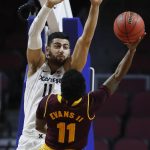 Xavier's Kerem Kanter, left, tries to block Arizona State's Shannon Evans II during the first period of an NCAA college basketball game Friday, Nov. 24, 2017, in Las Vegas. (AP Photo/John Locher)