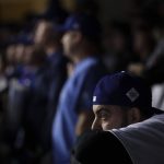 A Los Angeles Dodger fan watches during the eighth inning of Game 7 of baseball's World Series against the Houston Astros Wednesday, Nov. 1, 2017, in Los Angeles. (AP Photo/Jae C. Hong)